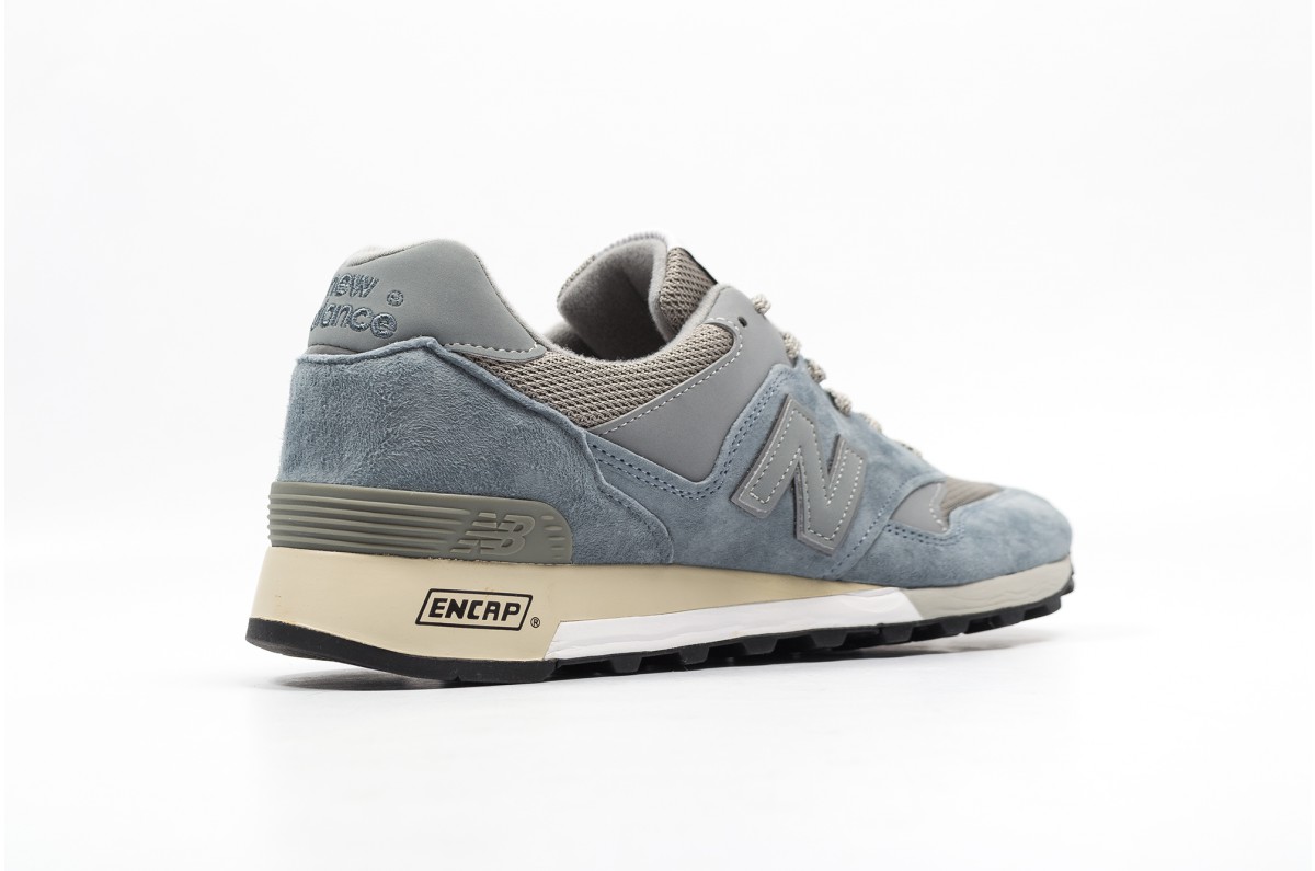 new balance piel gris